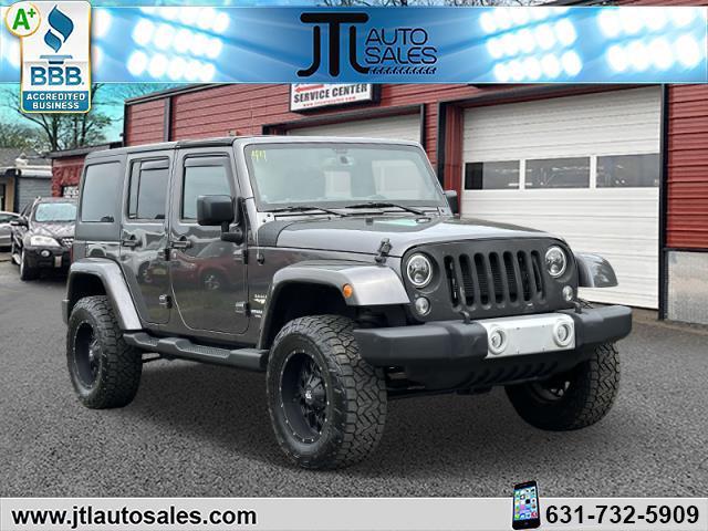 used 2014 Jeep Wrangler Unlimited car, priced at $19,790