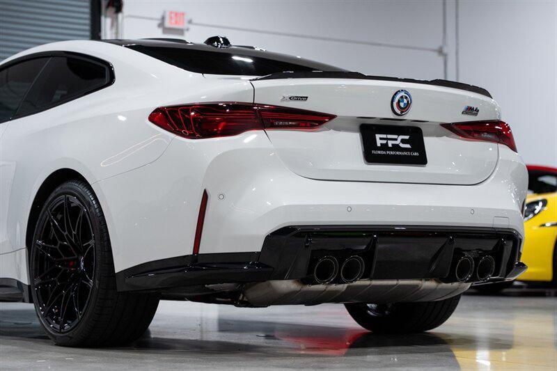 used 2025 BMW M4 car, priced at $92,900