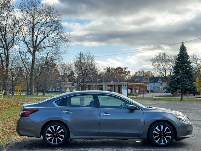 used 2018 Nissan Altima car, priced at $10,495