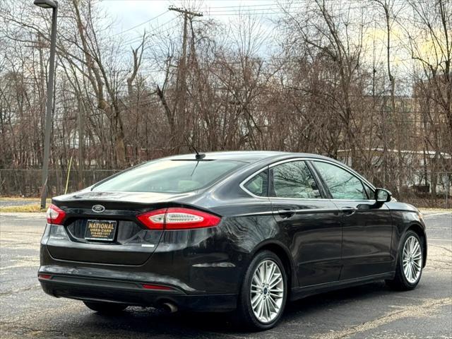 used 2015 Ford Fusion car, priced at $7,995