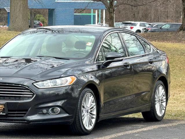 used 2015 Ford Fusion car, priced at $7,995