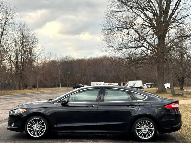 used 2015 Ford Fusion car, priced at $7,995