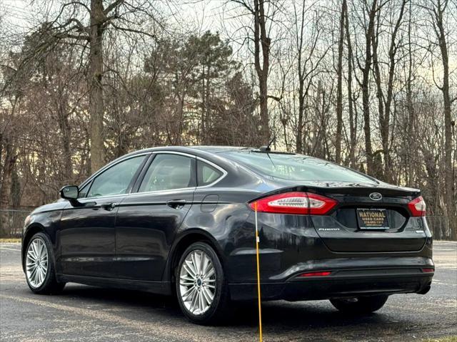 used 2015 Ford Fusion car, priced at $7,995