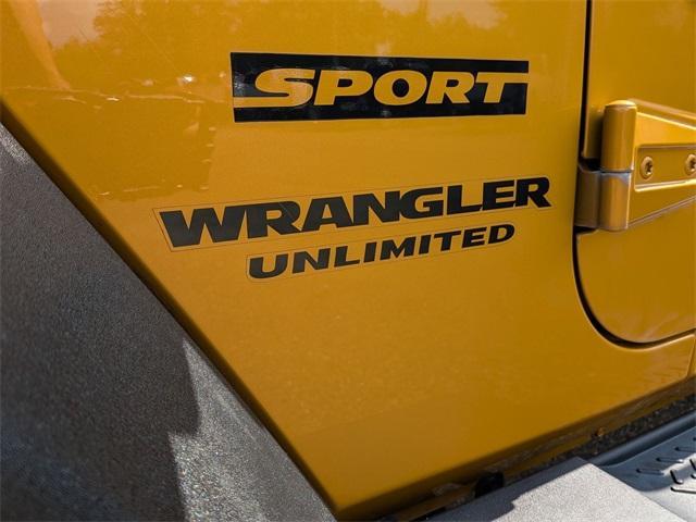used 2014 Jeep Wrangler Unlimited car, priced at $18,411