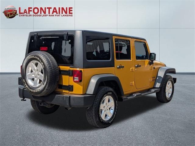 used 2014 Jeep Wrangler Unlimited car, priced at $18,411
