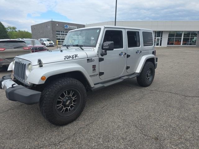 used 2011 Jeep Wrangler Unlimited car, priced at $11,609