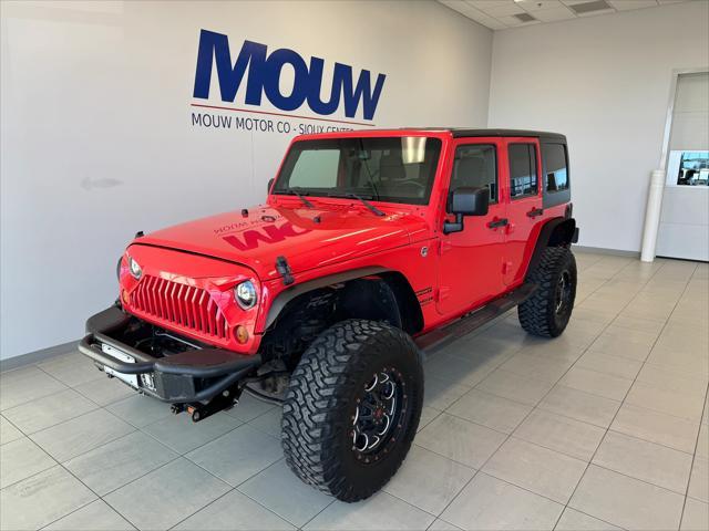 used 2013 Jeep Wrangler Unlimited car, priced at $15,450