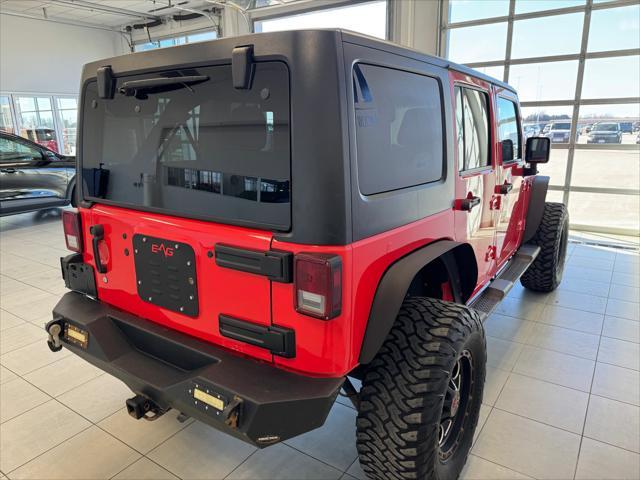 used 2013 Jeep Wrangler Unlimited car, priced at $15,450