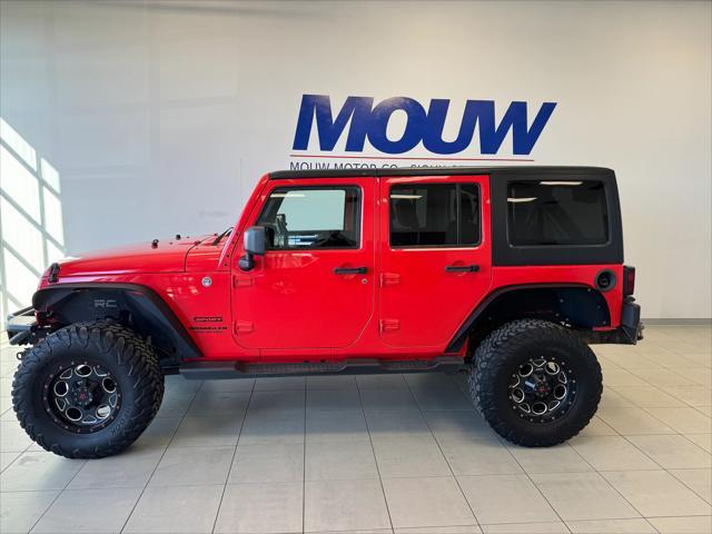 used 2013 Jeep Wrangler Unlimited car, priced at $15,450