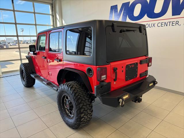 used 2013 Jeep Wrangler Unlimited car, priced at $15,450