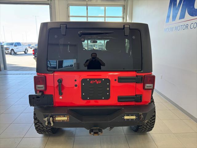 used 2013 Jeep Wrangler Unlimited car, priced at $15,450