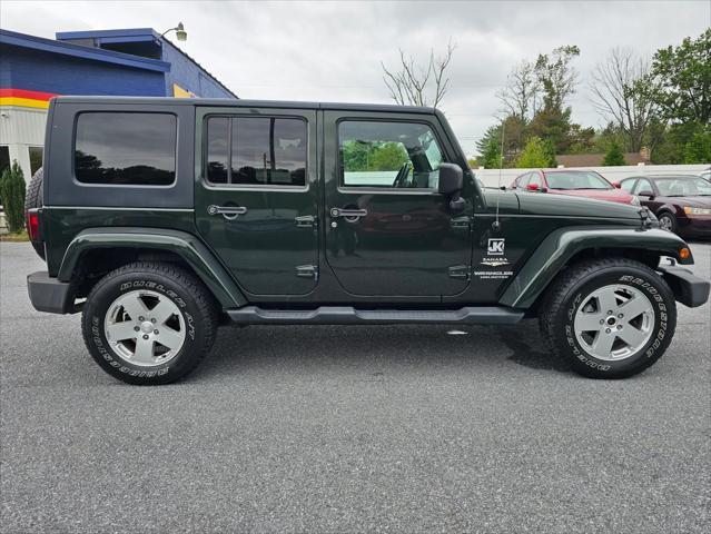 used 2010 Jeep Wrangler Unlimited car, priced at $15,403