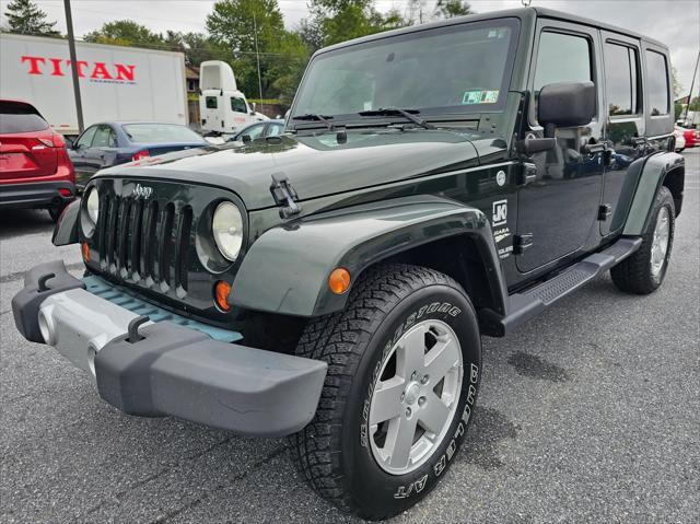 used 2010 Jeep Wrangler Unlimited car, priced at $15,403