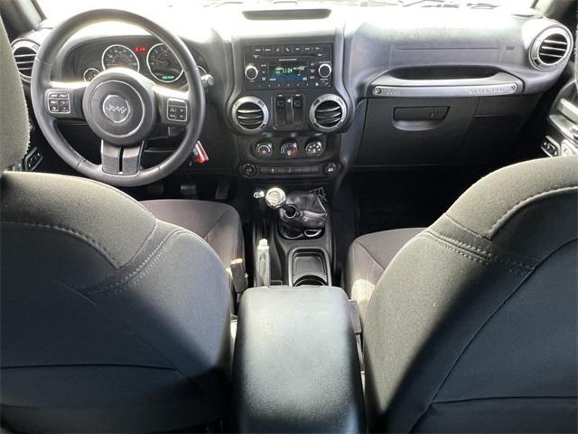 used 2015 Jeep Wrangler car, priced at $17,482