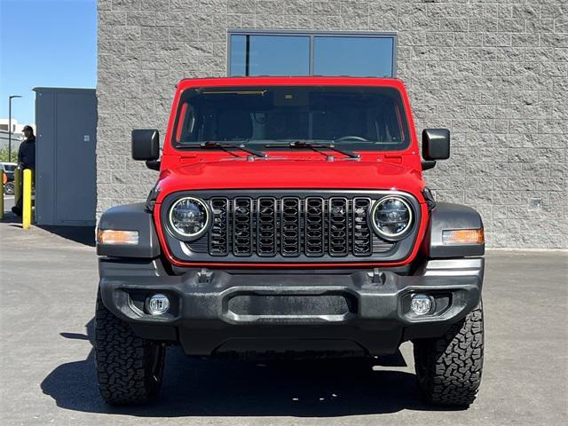 used 2024 Jeep Wrangler car, priced at $33,482