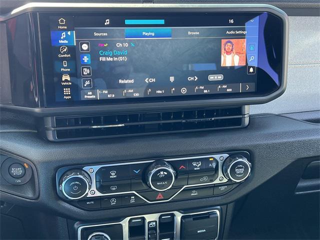 used 2024 Jeep Wrangler car, priced at $33,482