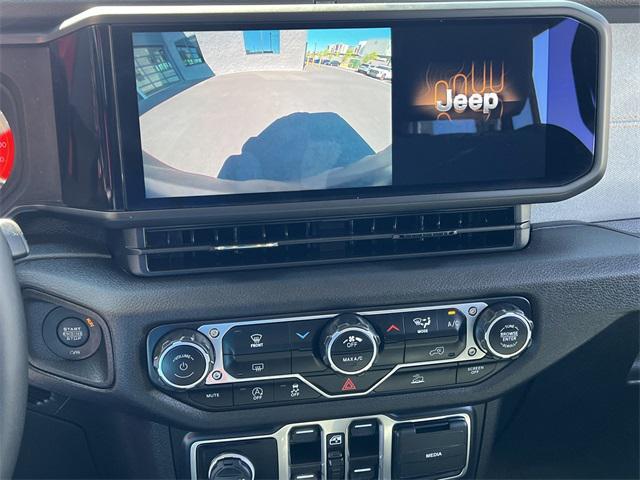 used 2024 Jeep Wrangler car, priced at $33,482