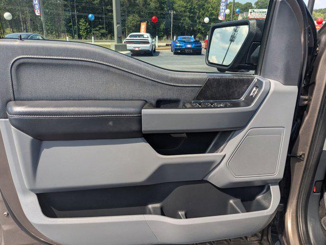 used 2023 Ford F-150 Lightning car, priced at $39,990