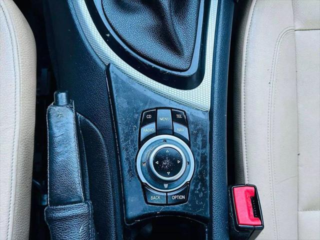 used 2011 BMW 128 car, priced at $9,999