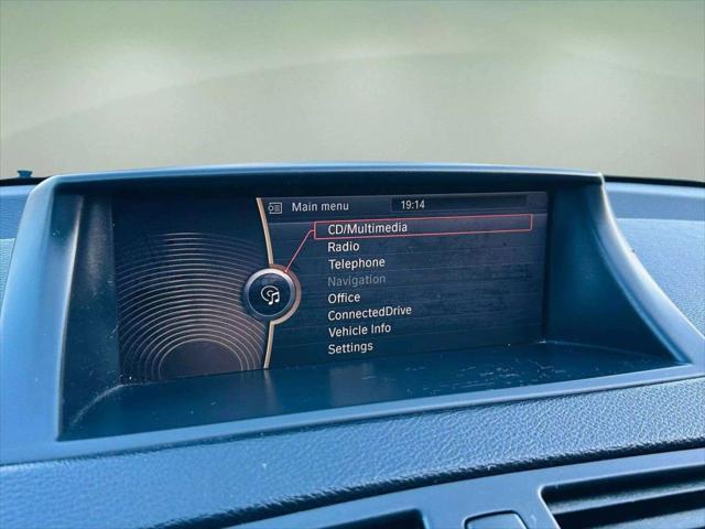 used 2011 BMW 128 car, priced at $9,999