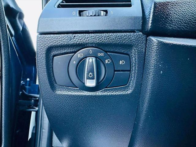 used 2011 BMW 128 car, priced at $9,999