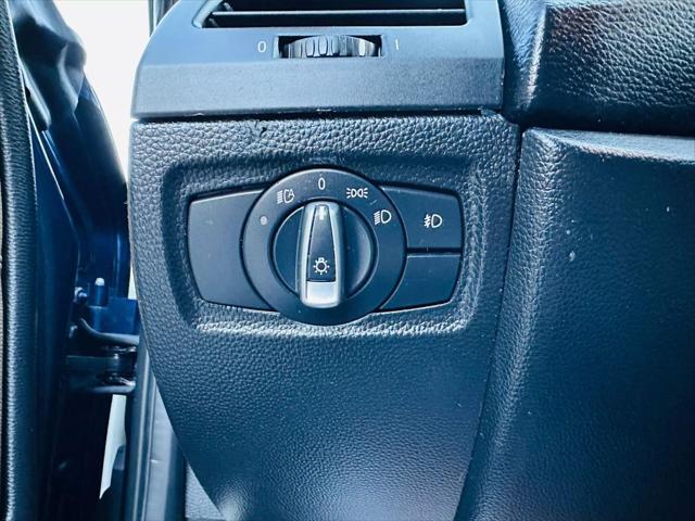 used 2011 BMW 128 car, priced at $9,999