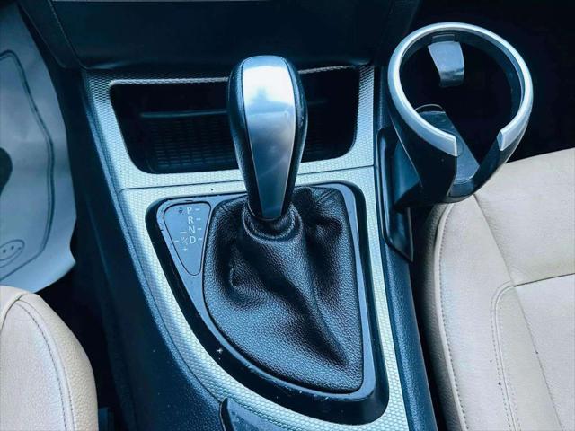 used 2011 BMW 128 car, priced at $9,999