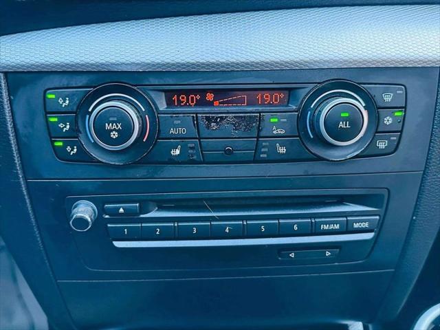 used 2011 BMW 128 car, priced at $9,999