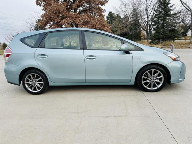 used 2015 Toyota Prius v car, priced at $13,999