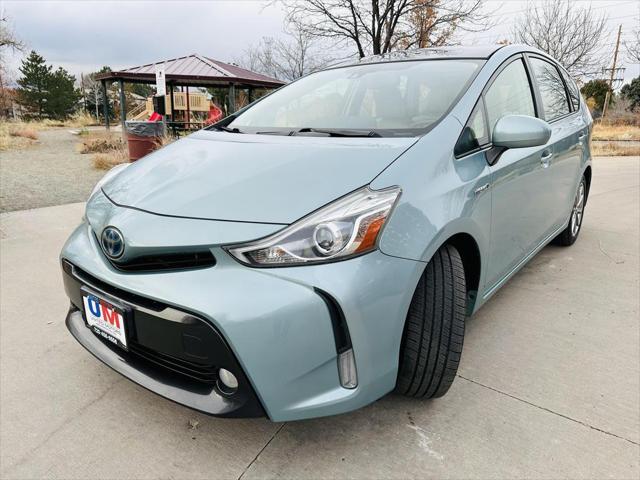 used 2015 Toyota Prius v car, priced at $13,999