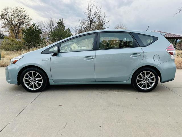 used 2015 Toyota Prius v car, priced at $13,999