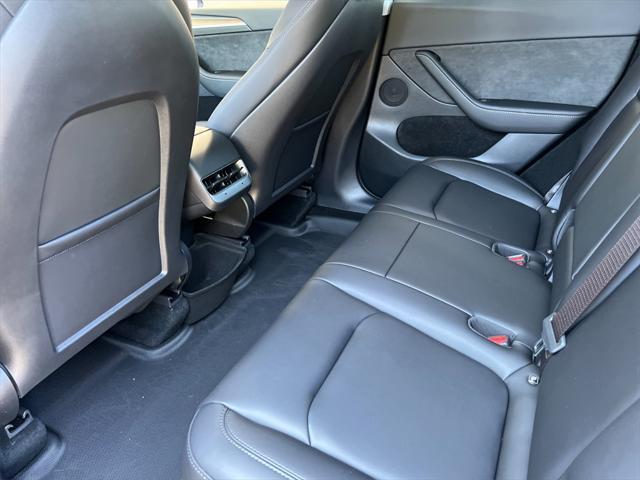 used 2024 Tesla Model Y car, priced at $38,996