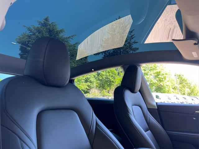 used 2024 Tesla Model Y car, priced at $38,996