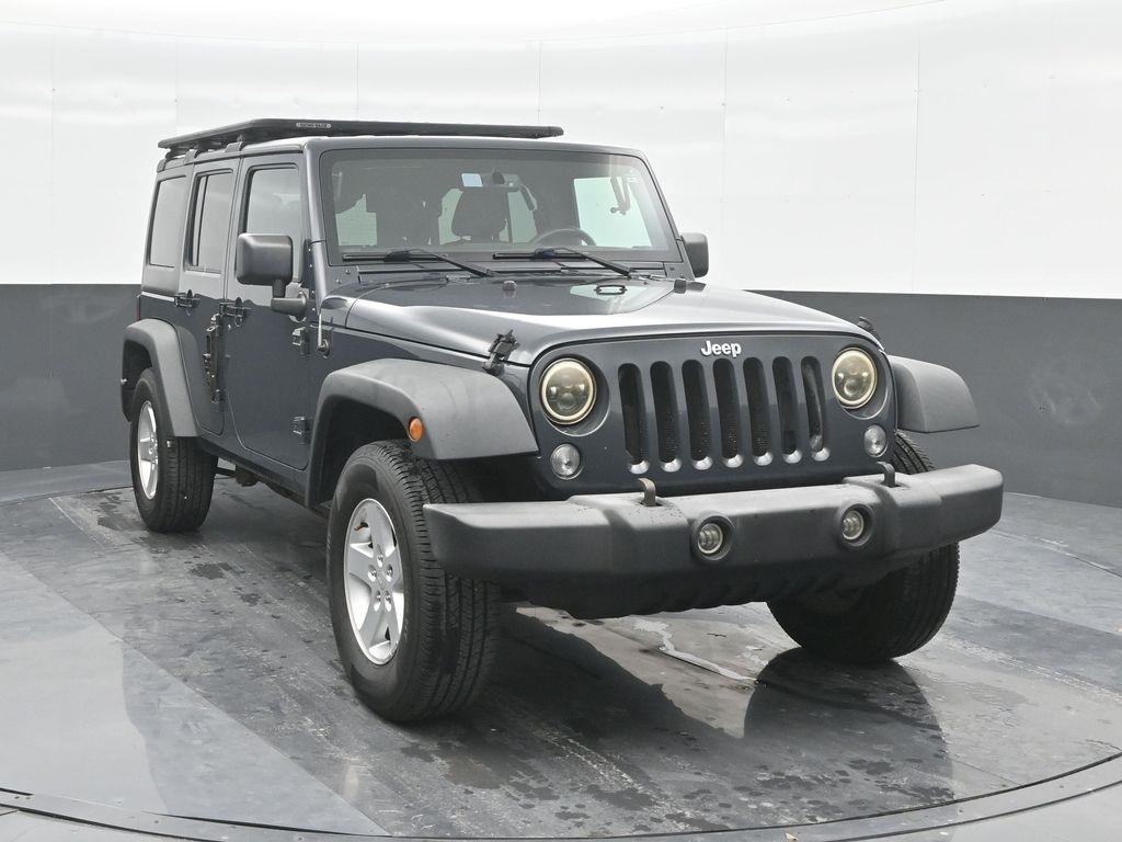 used 2016 Jeep Wrangler Unlimited car, priced at $17,591