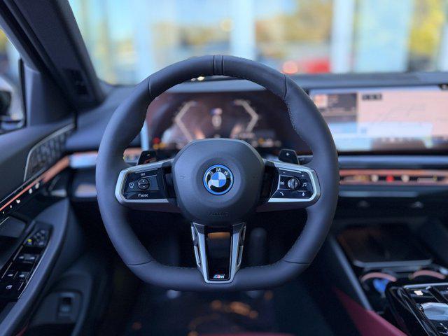 new 2026 BMW 550e car, priced at $84,315
