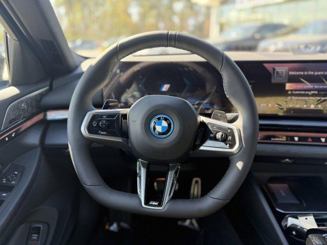 new 2025 BMW 550e car, priced at $82,005