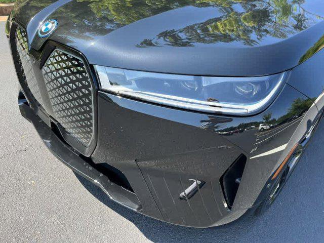 new 2025 BMW iX car, priced at $117,720