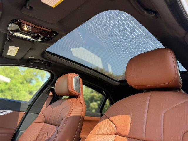new 2025 BMW 740 car, priced at $111,085
