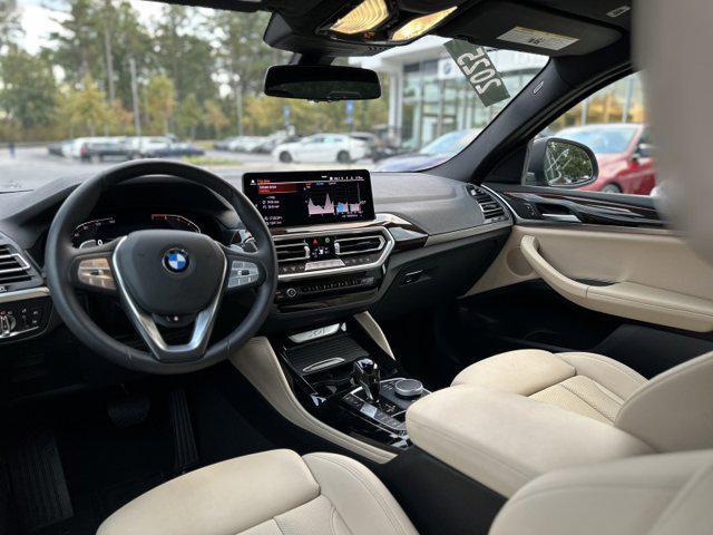 used 2025 BMW X4 car, priced at $49,990
