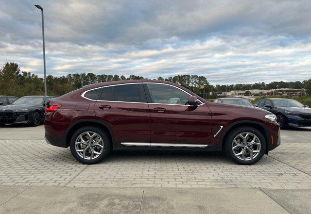used 2025 BMW X4 car, priced at $49,990