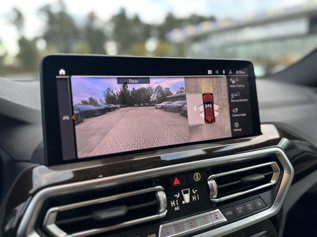 used 2025 BMW X4 car, priced at $49,990