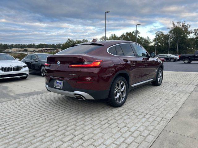 used 2025 BMW X4 car, priced at $49,990