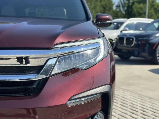 used 2021 Honda Pilot car, priced at $26,997