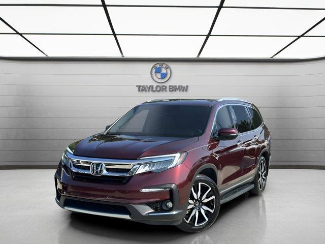 used 2021 Honda Pilot car, priced at $26,997