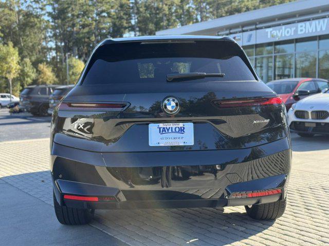 new 2026 BMW iX car, priced at $96,670