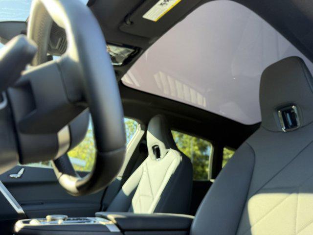 new 2026 BMW iX car, priced at $96,670