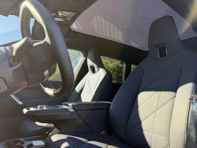 new 2026 BMW iX car, priced at $96,670