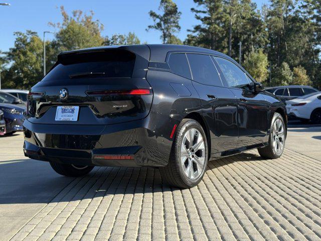 new 2026 BMW iX car, priced at $96,670