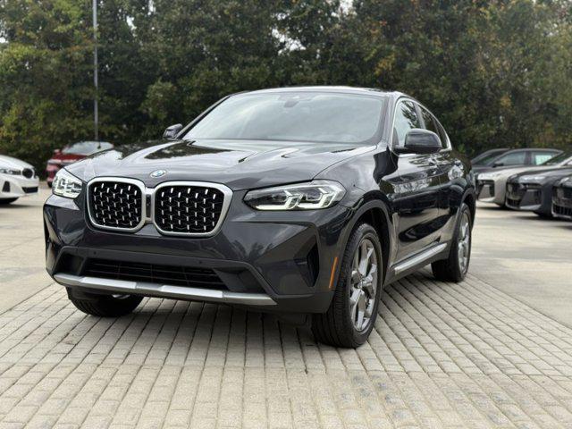 used 2024 BMW X4 car, priced at $49,990