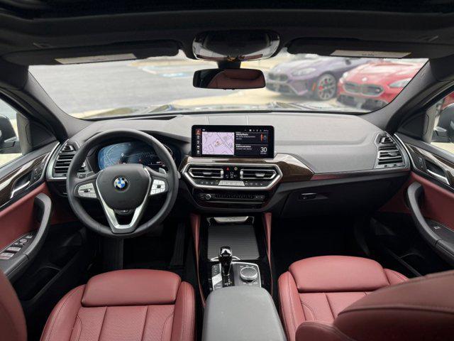 used 2024 BMW X4 car, priced at $49,990